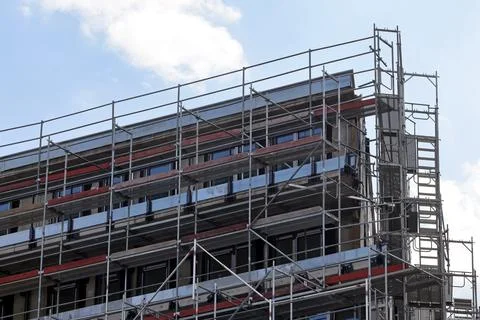 Scaffolding on a house facade Stock Photos