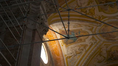 Scaffolding inside a frescoed dome undergoing restoration work Stock-Footage 330534588