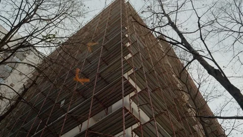 Scaffolding installation for building thermal insulation process Stock Footage 302922479