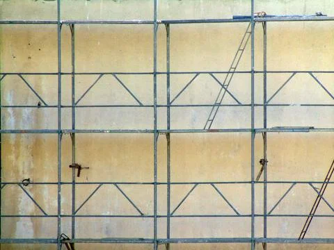 Scaffolding mounted on a wall for insulation work Stock Photos