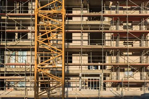 Scaffolding on a new building in shell construction Stock Photos