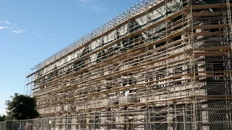 SCAFFOLDING ON NEW CONSTRUCTION 4K Stock Footage 40429758