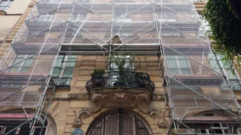 Scaffolding Set Up on a Historical Building Featuring Intricate Balconies in a Stock Footage 318555627
