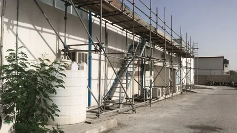 Scaffolding using Mild steel MS pipes for external surface of the building Stockbeeldmateriaal 168864874