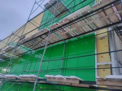 Scaffolding at the wall Stock Photos