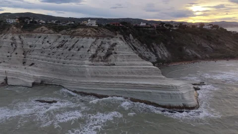 Scala dei Turchi white cliff and rough sea in Sicily at sunrise Stock Footage 346652261
