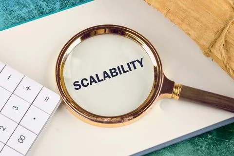 SCALABILITY word concept written in a notebook, detected with a magnifying gl 스톡 사진