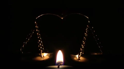 Scale and Candle in Dark Stock Footage 50757219