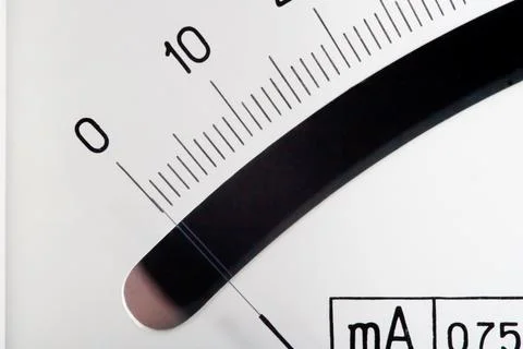 Scale with an arrow on a white background. Device for measuring the strength of Stock Photos