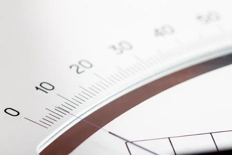 Scale with an arrow on a white background. Device for measuring the strength of Stock Photos