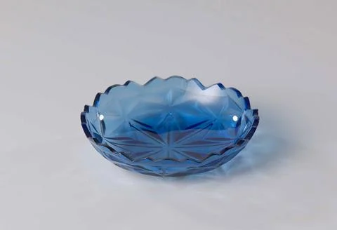 Scale with cut stallo pattern. Small bowl with scalloped edge. Sliding in ... Stock Photos