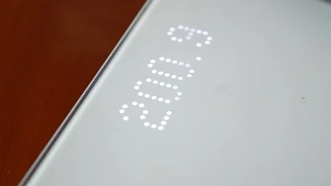 Scale display shows high weight, highlighting extreme obesity. Stock Footage 321750173