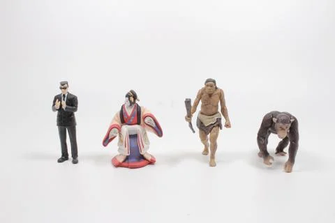 A scale of figure of Human Evolution Stock Photos