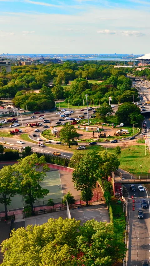Scale of Flushing Meadows park beside highway, Queens, New York Vertical video. Stock Footage 342273714
