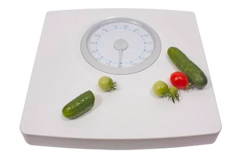 Scale with fresh vegetables Stock Photos