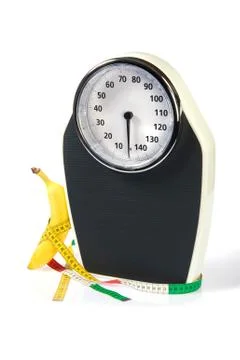 Scale with measuring tape Stock Photos