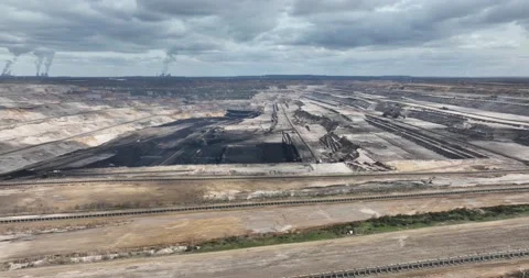 The scale of the mining operation brought to life from above, showing the sheer 스톡 동영상 236030279