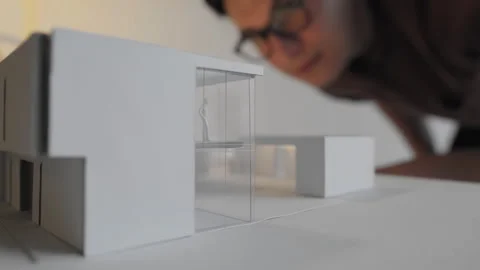 Scale model being checked Stock Footage 289391166