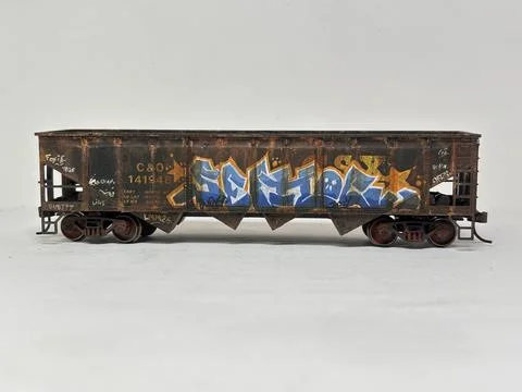 Scale model of coal hopper wagon railroad car with weathering effects Stock Photos