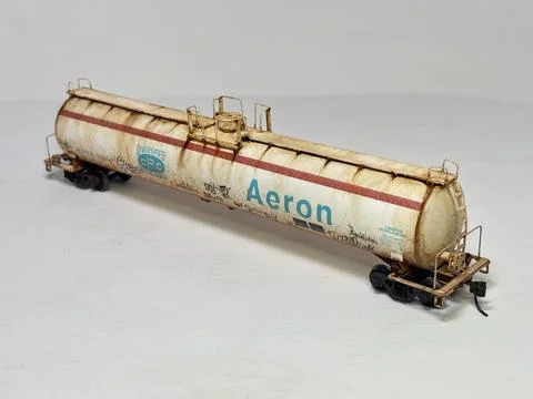 Scale model LPG tanker wagon with detailed custom weathering and graffiti Foto stock