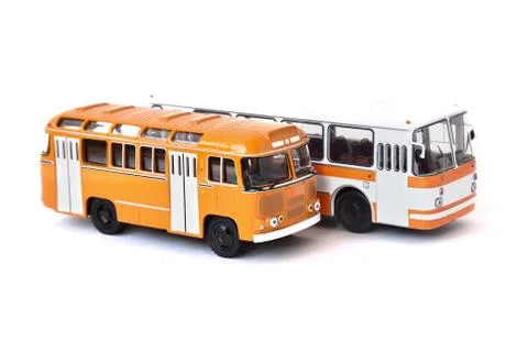 Scale model of a white and yellow Russian buses. Toy yellow bus Stock Photos