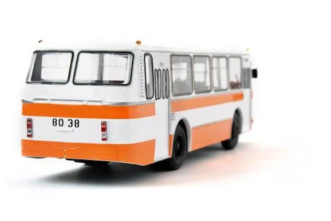 Scale model of a white yellow Russian bus. Toy yellow bus Stock Photos