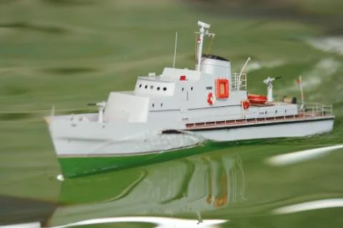 Scale ship model floating in the pool 写真素材