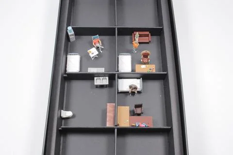 A scale of the subdivided Unit with mini figure Stock Photos