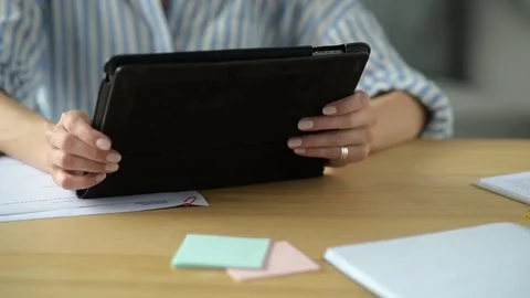 Scaled up look on young lady studying and making notes Stock Footage 78733540