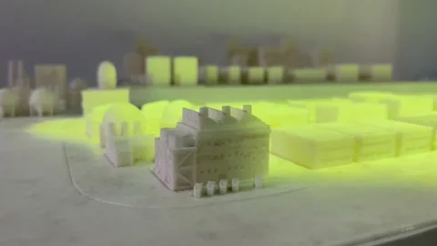A scaled weather model of a city using projection and lighting Stock Footage 175682410