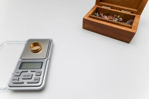 Scales for small items are on the table. Stock Photos