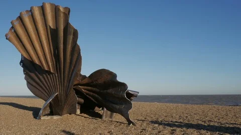 The Scallop sculpture, dedicated to Benjamin Britten on the beach at Aldeburgh Stock Footage 70323702