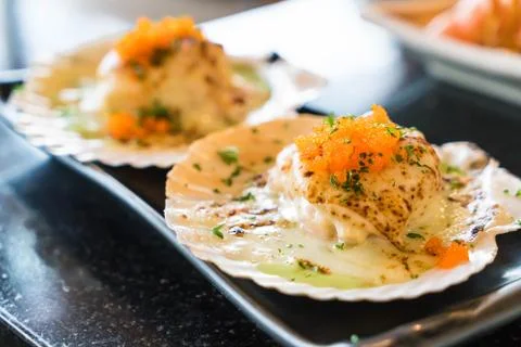 Scallops grilled cheese Stock Photos
