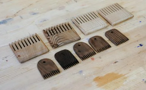Scallops on a wooden table in the workshop closeup. Stock Photos