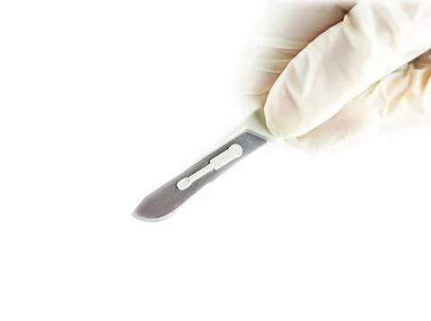 Scalpel in the hands of doctors Stock Photos