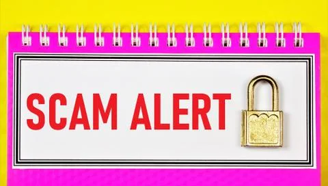 Scam alert - text message and security lock. Stock Photos