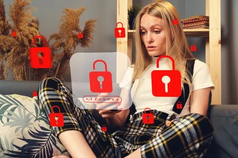 Scam call message prompts concern as person reads text on phone in living room Stock Photos
