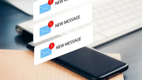 Scam call sms alert received on mobile device during daytime in a work setting Stock Photos