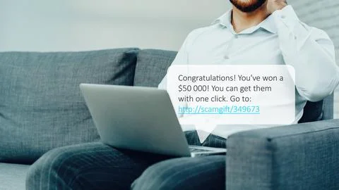 Scam call SMS message warns of fake prize won online Stock Photos