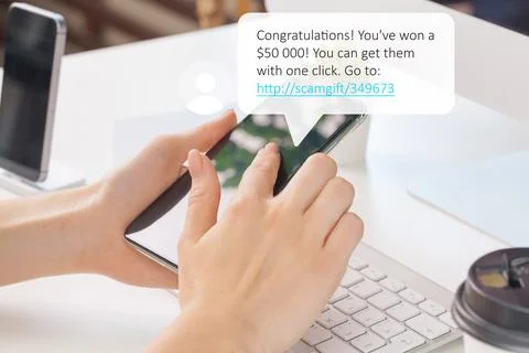 Scam call text message about winning money sent to a mobile phone Stock Photos