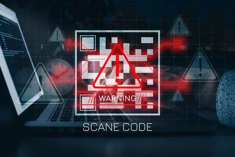Scam message appears on laptop screen warning users about potential threats Stock Photos