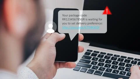 Scam message warning about a package delivery on a smartphone Stock Photos