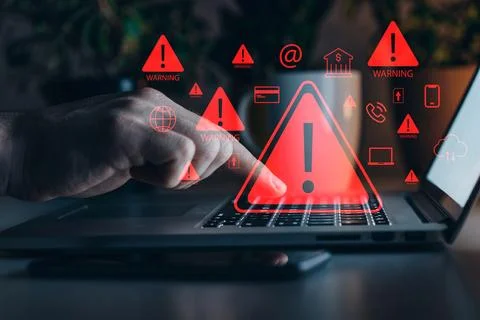 Scam message warning displayed on a computer screen during online activity Stock Photos