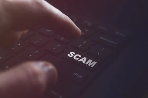 Scam word on PC keyboard Stock Photos