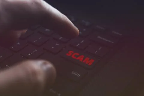 Scam word on PC keyboard Stock Photos