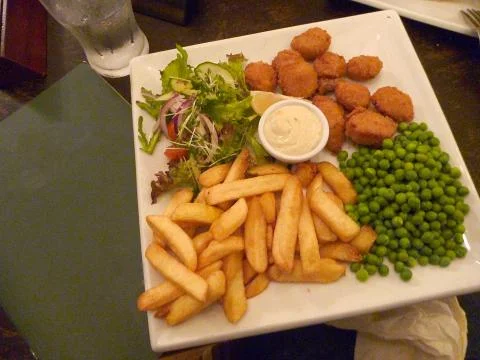 Scampi and chips Stock Photos