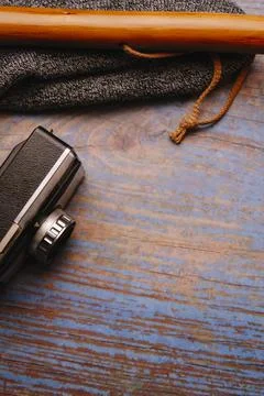 Scan background. Wooden background with camera, binoculars, cane... Stock Photos