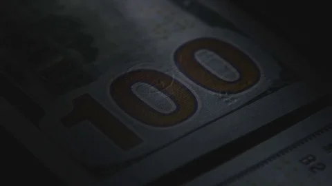 Scan a cash note for verification. Close-up and slowmotion Stock Footage 84436893