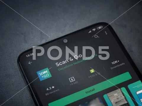 Scan & Go app play store page on the display of a black mobile ...