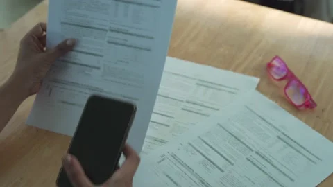 Scan online system. woman using a mobile phone scan barcode and QR code for p Stock Footage 164387819